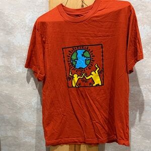 Uniqlo Red Graphic Tee with Yellow & Blue Print